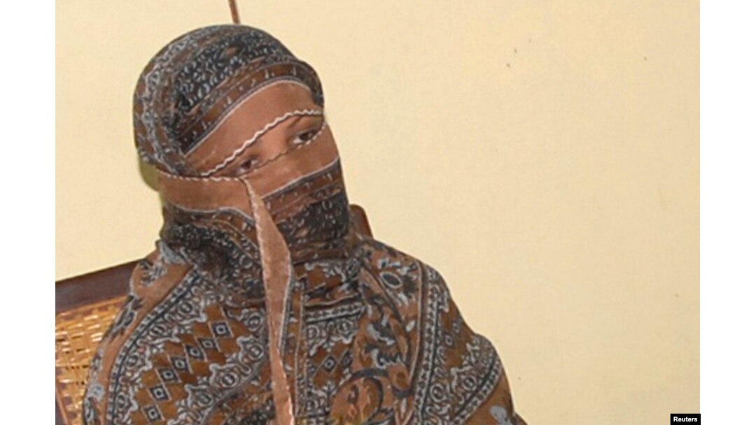 FILE - Pakistani Christian woman Asia Bibi is seen after a meeting with the governor of Punjab province at a jail in Sheikhupura, Pakistan.