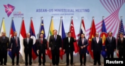 U.S. Secretary of State Mike Pompeo poses with other attendees during an ASEAN-U.S. Ministerial Meeting in Singapore, Aug. 3, 2018.