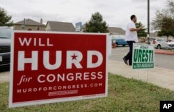 Rep. Will Hurd, R-Texas, visits with voters outside of a polling site, Nov. 8, 2016, in San Antonio, Texas.