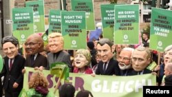 Oxfam’s Big Heads depict G20 leaders take part in protests ahead of the upcoming G20 summit in Hamburg, Germany, July 2, 2017.