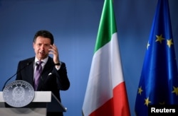 talian Prime Minister Giuseppe Conte holds a news conference at the European Union leaders summit in Brussels, Oct. 18, 2018.