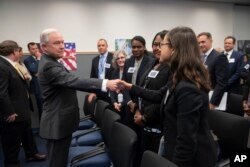 Attorney General Jeff Sessions greets new immigration judges after outlining Trump administration policies, in Falls Church, Va., Sept. 10, 2018.