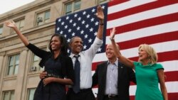 U.S. President Barack Obama, first lady Michelle Obama, U.S. Vice President Joseph Biden, and his wife, Dr. Jill Biden, all wave after Obama speaks at a campaign event at the University of Iowa's Jessup Hall Lawn in Iowa City, Iowa, September 7, 2012.