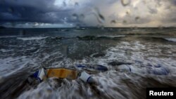 The remains of a dinghy, used by immigrants, is seen during a storm in Kos island, Greece, early May 29, 2015. 