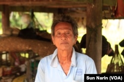 Mey Chham, 69, a resident of Sovong village in Taches commune, was uncomfortable telling his village chief he did not want to join the CPP when she came to his house and asked for photographs of each of his family members to register them in a CPP family.
