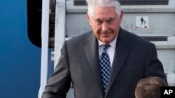 U.S. Secretary of State Rex Tillerson steps out of his plane upon arrival at Moscow's Vnukovo airport, April 11, 2017.