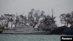 Ukrainian naval ships, which were recently seized by Russia's FSB security service, are seen anchored in a port in Kerch, Crimea Nov. 28, 2018.