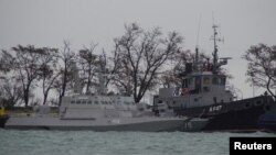 Ukrainian naval ships, which were recently seized by Russia's FSB security service, are seen anchored in a port in Kerch, Crimea, Nov. 28, 2018. 