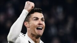 Juventus' Portuguese forward Cristiano Ronaldo celebrates after scoring 2-0 during the UEFA Champions League round of 16 second-leg football match Juventus vs Atletico Madrid on March 12, 2019 at the Juventus stadium in Turin. (Photo by Marco BERTORELLO /