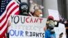 Učesnici protesta protiv restriktivnih mera u državi Vašington, 19. april 2020. (Foto: Reuters/Lindsey Wasson)