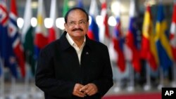 FILE - India's Vice President M. Venkaiah Naidu arrives for the ASEM 12 in Brussels, Oct. 18, 2018. 