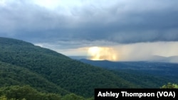 A rainstorm is seen from a distance in the Shenandoah Valley, Virginia. (Photo Credit: Ashley Thompson for VOA)
