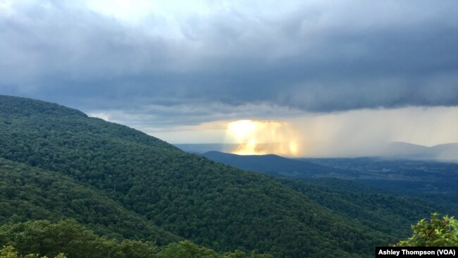 A rainstorm is seen from a distance in the Shenandoah Valley, Virginia. (Photo Credit: Ashley Thompson for VOA)