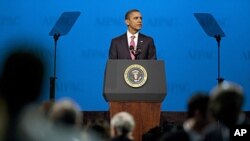 US President Barack Obama pauses as he speaks during the American Israel Public Affairs Committee policy conference in Washington March 4, 2012. 