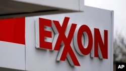 This April 29, 2014 photo shows an Exxon sign at a Exxon gas station in Carnegie, Pennsylvania. (AP/Gene J. Puskar)