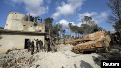 FILE - Turkish forces and Free Syrian Army members are seen on Mount Barsaya, northeast of Afrin, Syria Jan. 28, 2018. 