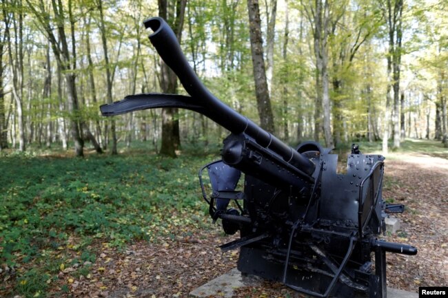A damaged cannon is on display in the middle of Belleau Wood behind the Aisne-Marne American Cemetery dedicated to the U.S. soldiers killed in the Belleau Wood battle during the World War I at Belleau, France, Nov. 6, 2018.