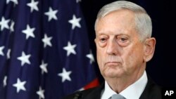 FILE - Defense Secretary James Mattis attends a news conference, Aug. 17, 2017.