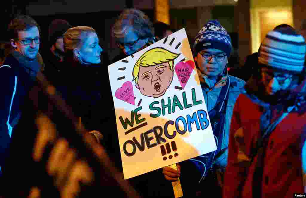 Anti-Trump protesters gather during a protest against the inauguration of U.S. President-elect Donald Trump, in Berlin, Jan. 20, 2017.