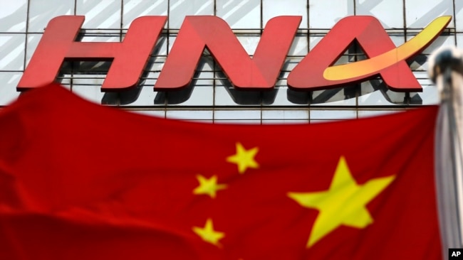 资料照：中国国旗在北京海航集团办公大楼前飘扬。