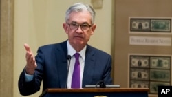 FILE - Federal Reserve Chairman Jerome Powell addresses the Federal Reserve Board's 15th annual College Fed Challenge Finals in Washington, Nov. 29, 2018.