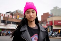 Teresa Ting stands for a portrait, Wednesday, March 31, 2021, in the Flushing neighborhood of the Queens borough of New York. “It literally could have been my mother had it been the wrong place, wrong time," Ting said of that attack. (AP Photo/John Minchilo)