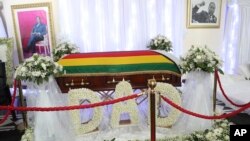 The coffin of the late former Zimbabwean leader Robert Mugabe at his residence in Harare, Thursday Sept. 12, 2019. Zimbabwe's founding leader Robert Mugabe made his final journey back to the country Wednesday.