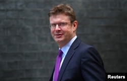 FILE - British Secretary of State Greg Clark arrives at Downing Street, London, on September 4, 2018.