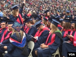 Some of the 6,000 Liberty University graduates are seen in the school's football stadium for the Christian university's 44th commencement, in Lynchburg, Virginia, May 13, 2017.