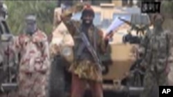 FILE - The leader of Nigeria's Islamic extremist group Boko Haram, Abubakar Shekau, speaks in this file image made from video received by The Associated Press on May 5, in which his group claimed responsibility for the April 15 mass abduction of nearly 30