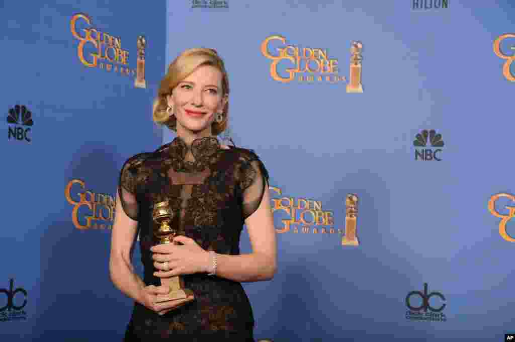 Cate Blanchett poses with the award for best actress in a motion picture - drama for "Blue Jasmine" at Golden Globe Awards at the Beverly Hilton Hotel, Jan. 12, 2014.