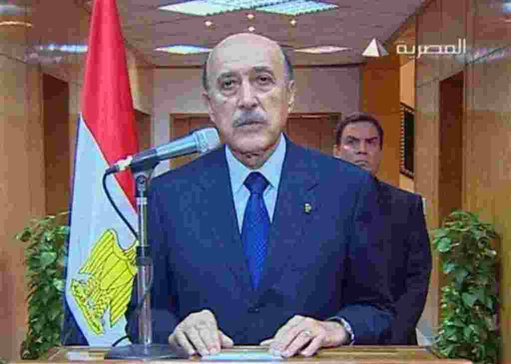 In this photo taken from Egyptian television, Egypt's vice president Omar Suleiman makes the announcement that Egyptian President Hosni Mubarak has stepped down from office, Friday, Feb. 11, 2011, in Cairo, Egypt. (AP Photo/Egypt TV) TV OUT - EGYPT OUT