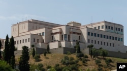 U.S. Marines stand guard on the roof of U.S. consulate in Istanbul, July 18, 2016, during a failed coup attempt against the government of President Recep Tayyip Erdogan. 