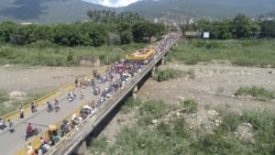 Migranti iz Venecuele na granici sa Kolumbijom