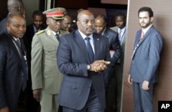 FILE - Democratic Republic of Congo's President Joseph Kabila arrives for a southern and central African leaders' meeting to discuss the political crisis in the DRC in Luanda, Angola.
