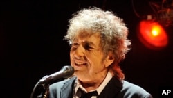 FILE - In this Jan. 12, 2012 file photo, Bob Dylan performs in Los Angeles. 