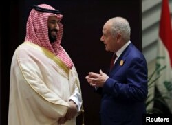 Saudi Arabia's Crown Prince Mohammed bin Salman talks with Secretary General of Arab League, Ahmed Aboul Gheit, ahead of the 29th Arab Summit in Dhahran, Saudi Arabia, April 15, 2018.