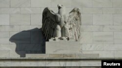 FILE - A detail from the front of the U.S. Federal Reserve Board building is shown in Washington. 