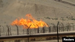 Lapangan minyak Bai Hassan di barat laut Kirkuk, 12 Juli 2014. (Foto:Dok)