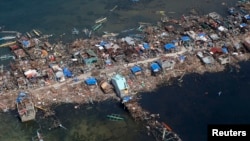 An aerial view of a fishing village in Guiwan town, devastated by super Typhoon Haiyan, in Samar province in central Philippines Nov. 11, 2013. 