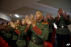 North Korean military cadets attend an evening gala held on the eve of the 70th anniversary of North Korea's founding day in Pyongyang, North Korea, Sept. 8, 2018.