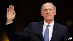Director of National Intelligence-designate Dan Coats is sworn-in on Capitol Hill in Washington, Feb. 28, 2017, at his confirmation hearing before the Senate Intelligence Committee.