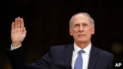 Director of National Intelligence-designate Dan Coats is sworn-in on Capitol Hill in Washington, Feb. 28, 2017, at his confirmation hearing before the Senate Intelligence Committee. in Washington. 
