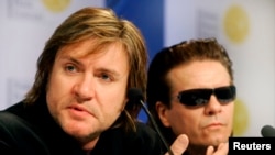 FILE - British band Duran Duran's Simon Le Bon (L) and Andy Taylor attend a news conference.