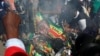 In Zimbabwe Clashes as Election Results Delayed