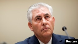FILE - Rex Tillerson, chairman and CEO of ExxonMobil, testifies about the company's acquisition of XTO Energy before the House Energy and Environment Subcommittee on Capitol Hill in Washington .