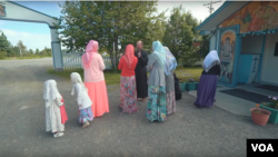 Members of the Old Believers community, wearing traditional clothes, in Nikolaevsk, Alaska.