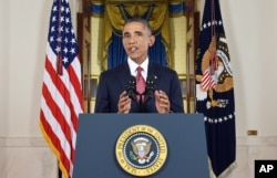 President Barack Obama addresses the nation from the Cross Hall in the White House in Washington, Wednesday, Sept. 10, 2014.