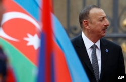 FILE - President of Azerbaijan Ilham Aliyev arrives for a meeting on the 5th anniversary of the Eastern Partnership at the Prague Castle in Prague, Czech Republic.