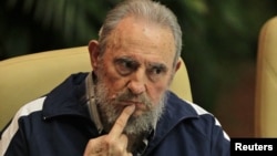 Former Cuban leader Fidel Castro attends the closing ceremony of the sixth Cuban Communist Party (PCC) congress in Havana in this April 19, 2011 file photo. 
